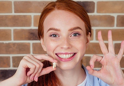 girl doing okay sign with wisdom tooth