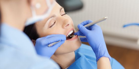 woman sedated having dental work done