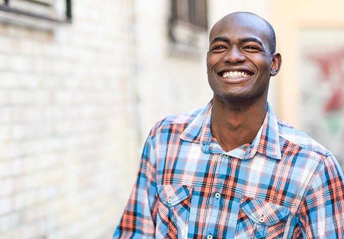 man smiling outside