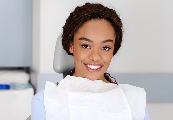 teen girl sitting in exam chair