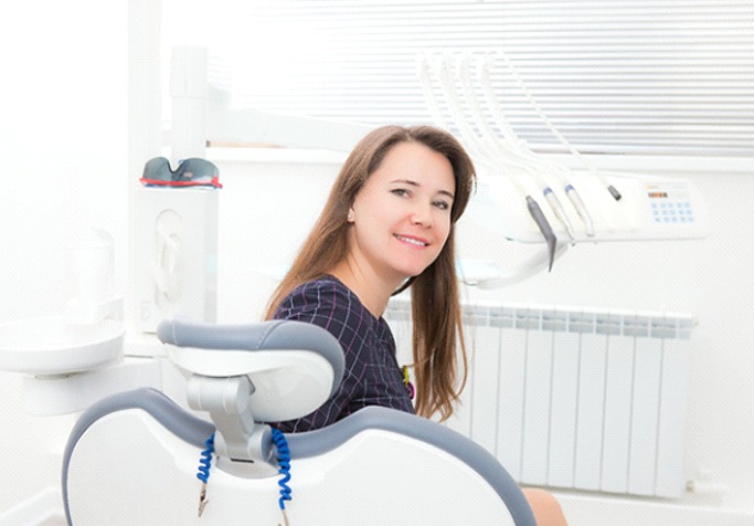 Woman smiling in dental chair