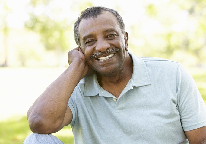 man smiling outside