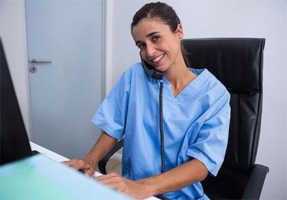 dental team member talking on the phone