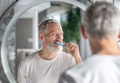 Man brushing teeth