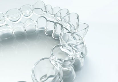 Closeup of Invisalign in Plainview on white background