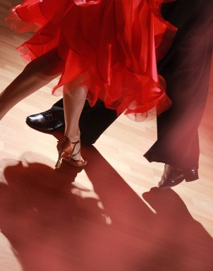 people in dancing clothes walking