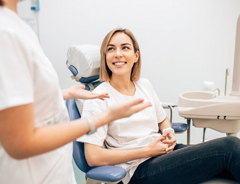 woman at her oral cancer screening in Plainview