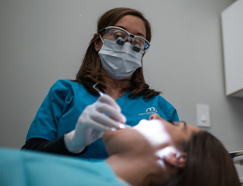 Plainview Dentist performing checkup