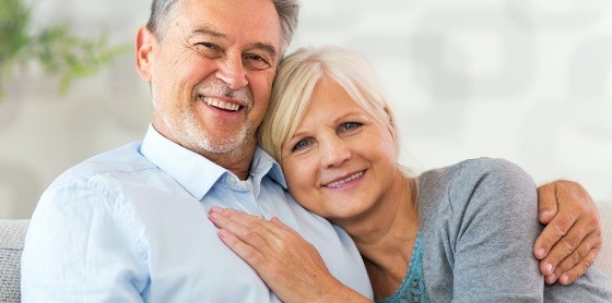 husband hugging woman