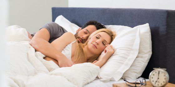 husband and wife sleeping