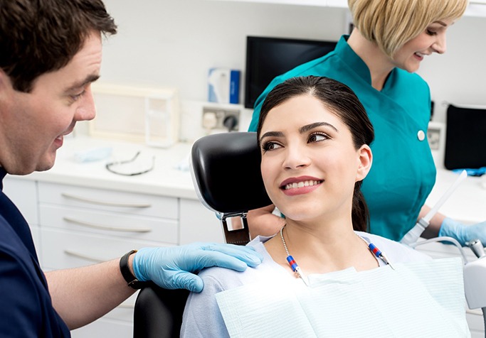 smiling during appointment for equilibration