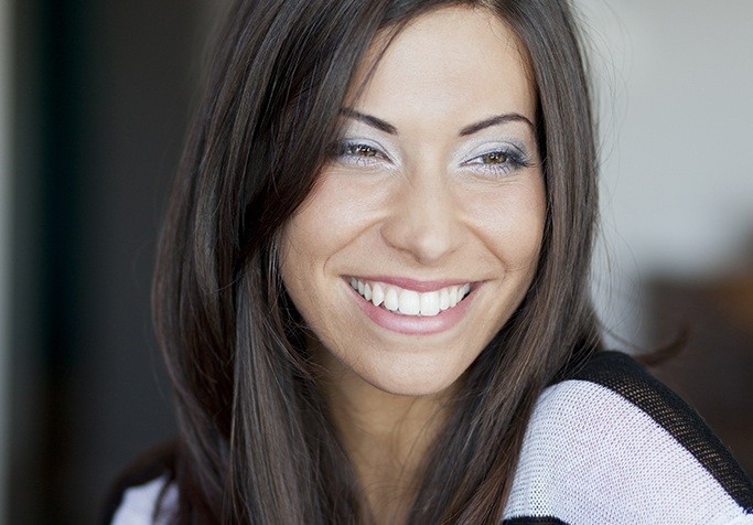 woman smiling over shoulder