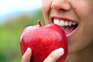 person eating an apple